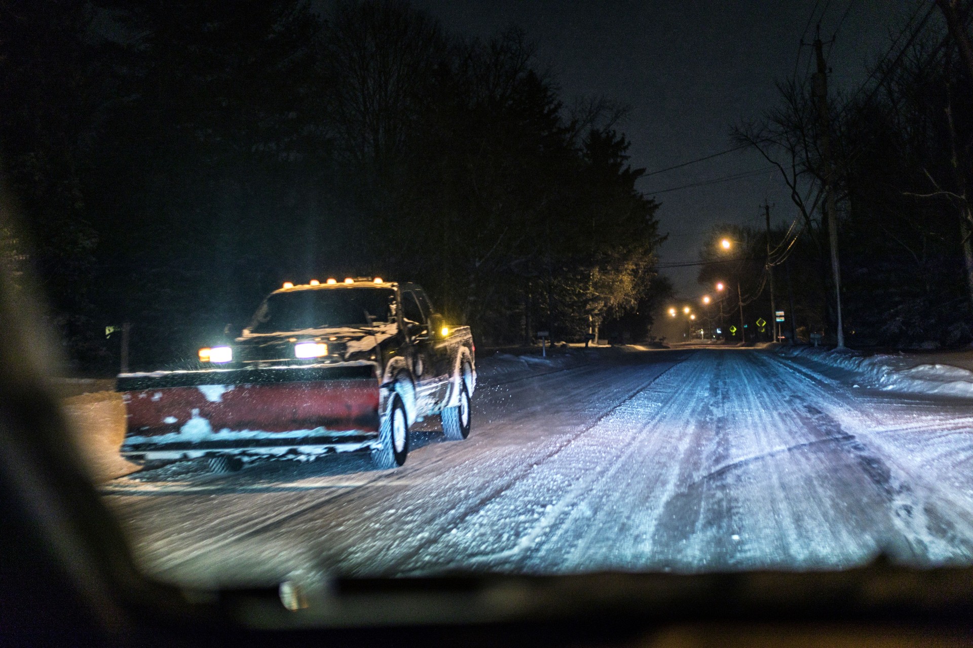 Car Point of View Passing Snow Plow Pick-Up Truck